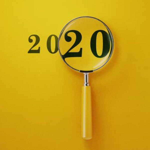 a magnifying glass over the number 2020