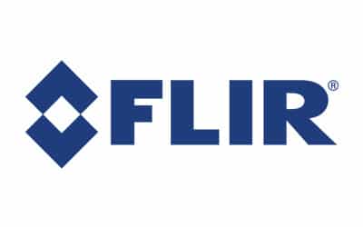 The image features the logo of FLIR Systems, Inc. It consists of the word 'FLIR' in bold, blue capital letters with a blue diamond-shaped design with a white center on the left. The logo is set against a white background.